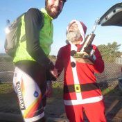Club president James McFarland congratulates winner Ian Inglis